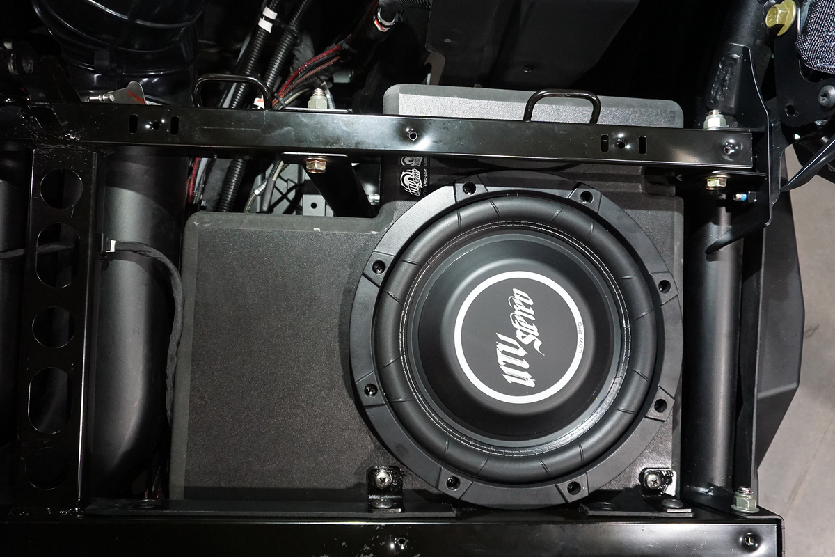 UTV Stereo Low Pro subwoofer installed in vehicle chassis
