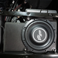 UTV Stereo low profile subwoofer mounted in a vehicle frame