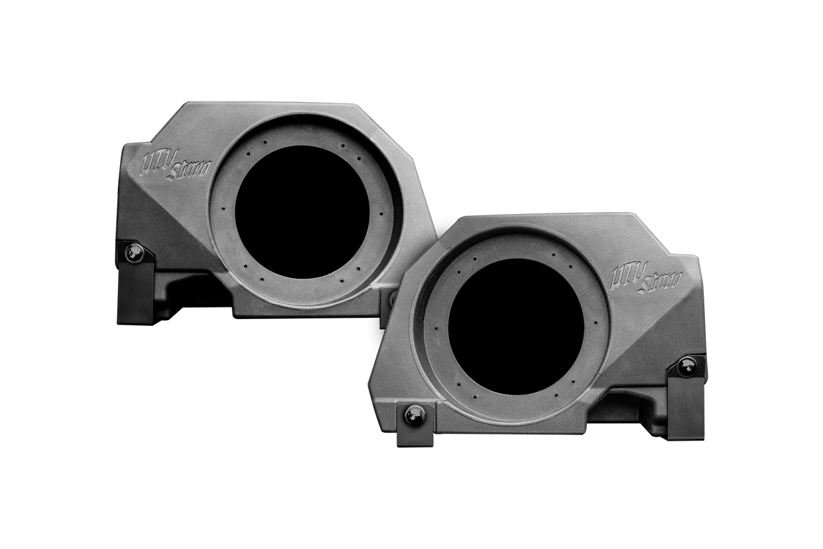 Two UTV Stereo speaker pods with black enclosures