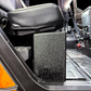 UTV Stereo subwoofer enclosure installed under the passenger seat of a side by side vehicle