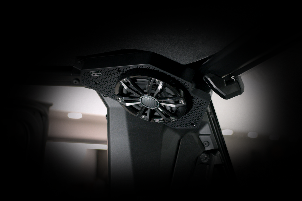 UTV Stereo speaker mounted to the roll cage of a vehicle