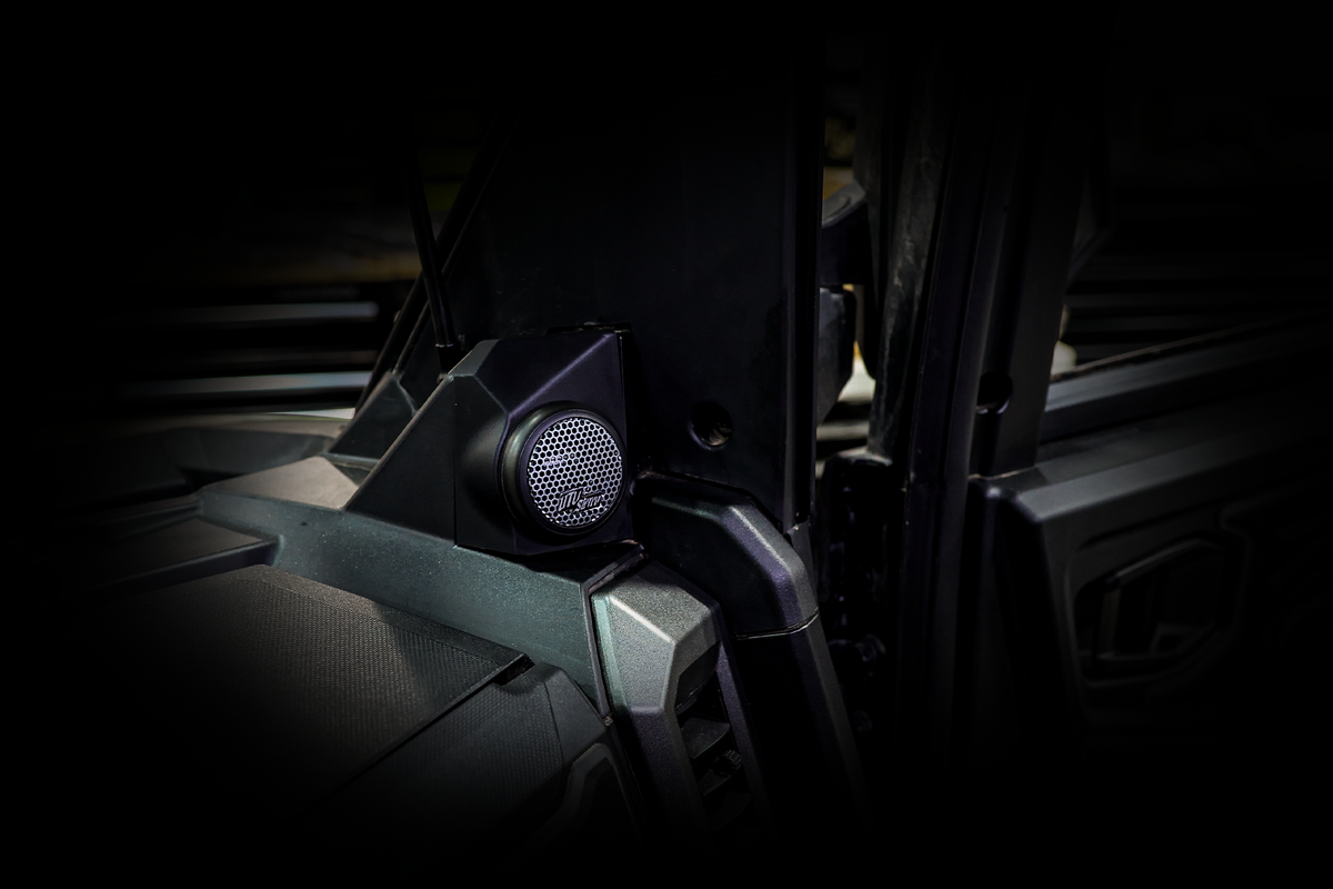 UTV Stereo speaker mounted on the interior pillar of a vehicle